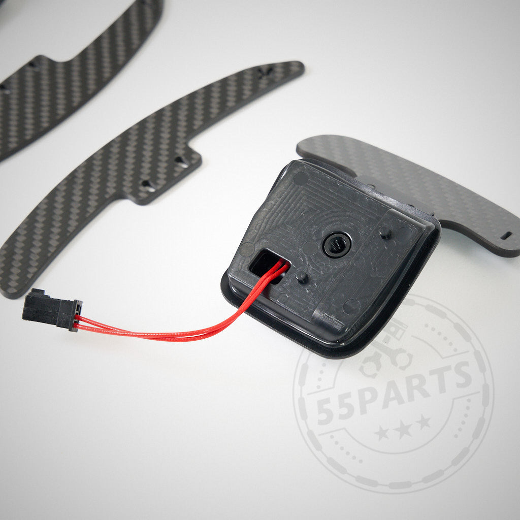 55Parts Special: V2 Magnetische Schaltwippen passend für BMW E9X M3, mit Verkabelung und Stecker, abgebildet auf weißem Hintergrund.