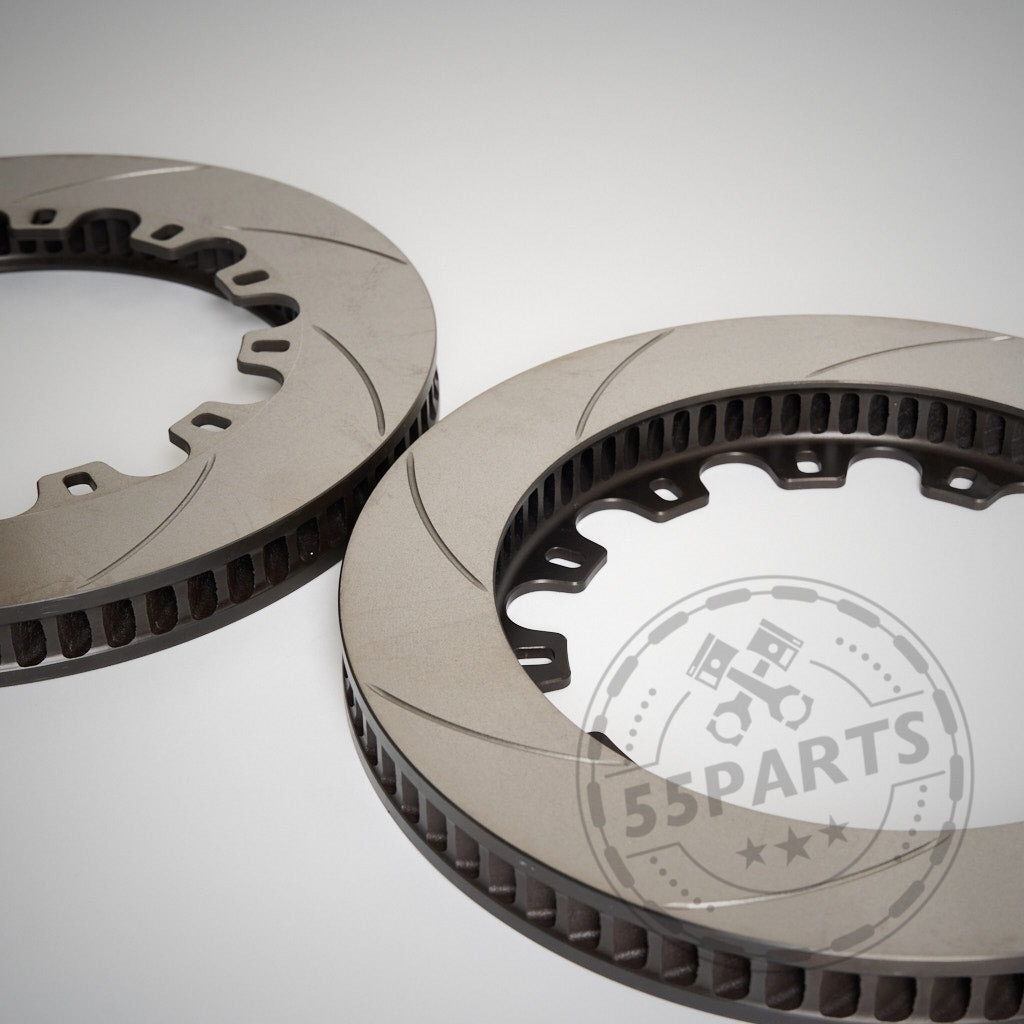 Die 55Parts AP Racing 378 x 36 mm CP5772-2068/69 Reibringe – in Nahaufnahme auf einer hellen Oberfläche gezeigt – sind perfekt für alle, die ihre Serienbremsanlage verbessern oder die Leistung ihrer BMW-Rennstreckenbremsen aufrüsten möchten.