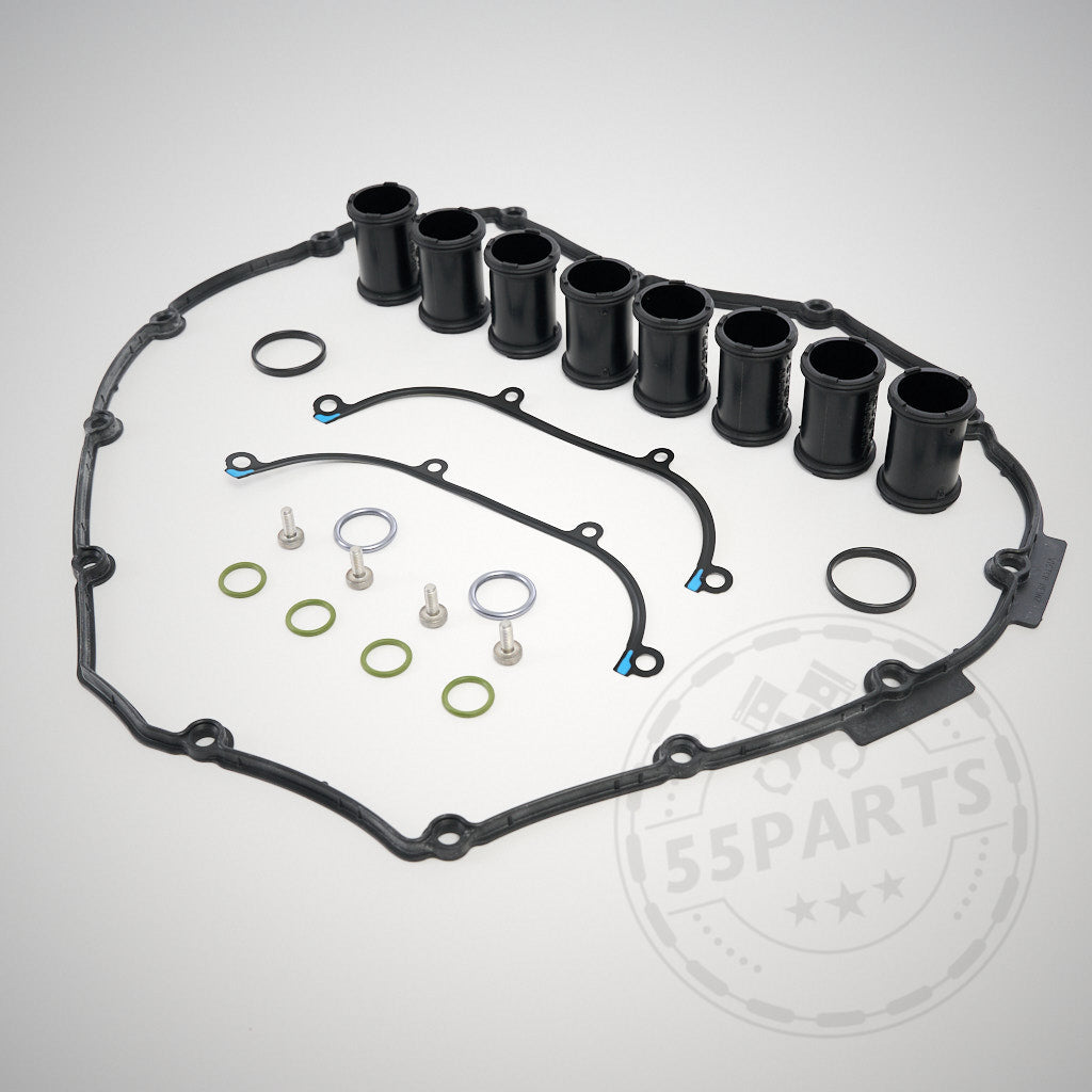 Das exklusive 55Parts-Einbauset Ventildeckel für den BMW E9x M3 (S65-Motor) verfügt über schwarze Gummidichtungen, Schläuche, Metallscheiben und Dichtungen, die sauber auf einer hellen Oberfläche angeordnet sind.
