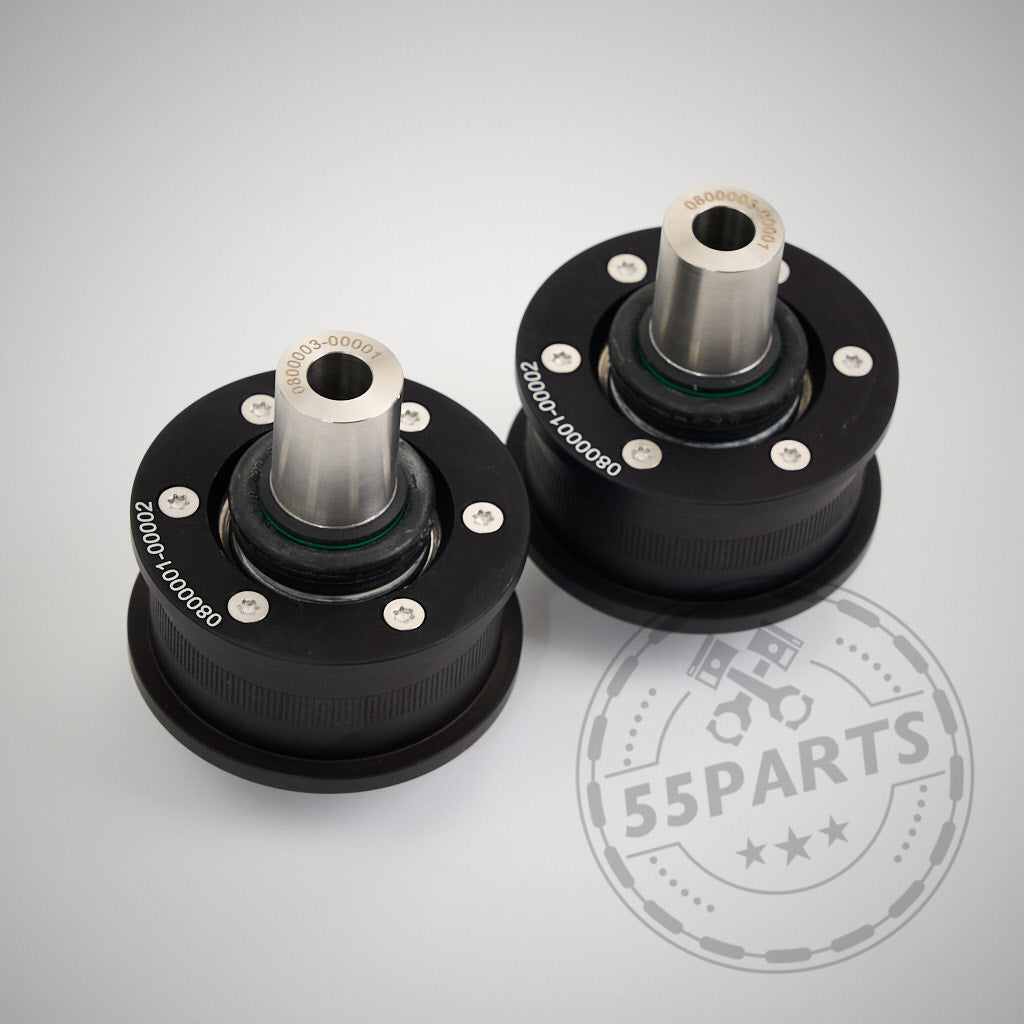 Zwei schwarze NoFlex-Lager (Uniball Lager) mit silbernen Wellen und Schrauben, nebeneinander auf hellem Untergrund – passend für BMW 1er, 2er, 3er, 4er F-Serie (F2x, F3x) inkl. xDrive Modelle (alle Motorisierungen).