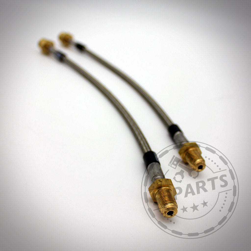 Zwei Fischer Stahlflex-Bremsleitungen mit ABE und Messingbeschlägen sind parallel auf weißem Grund abgebildet. Passend für Mini Cooper R50, R53, R56, F56 und R60.