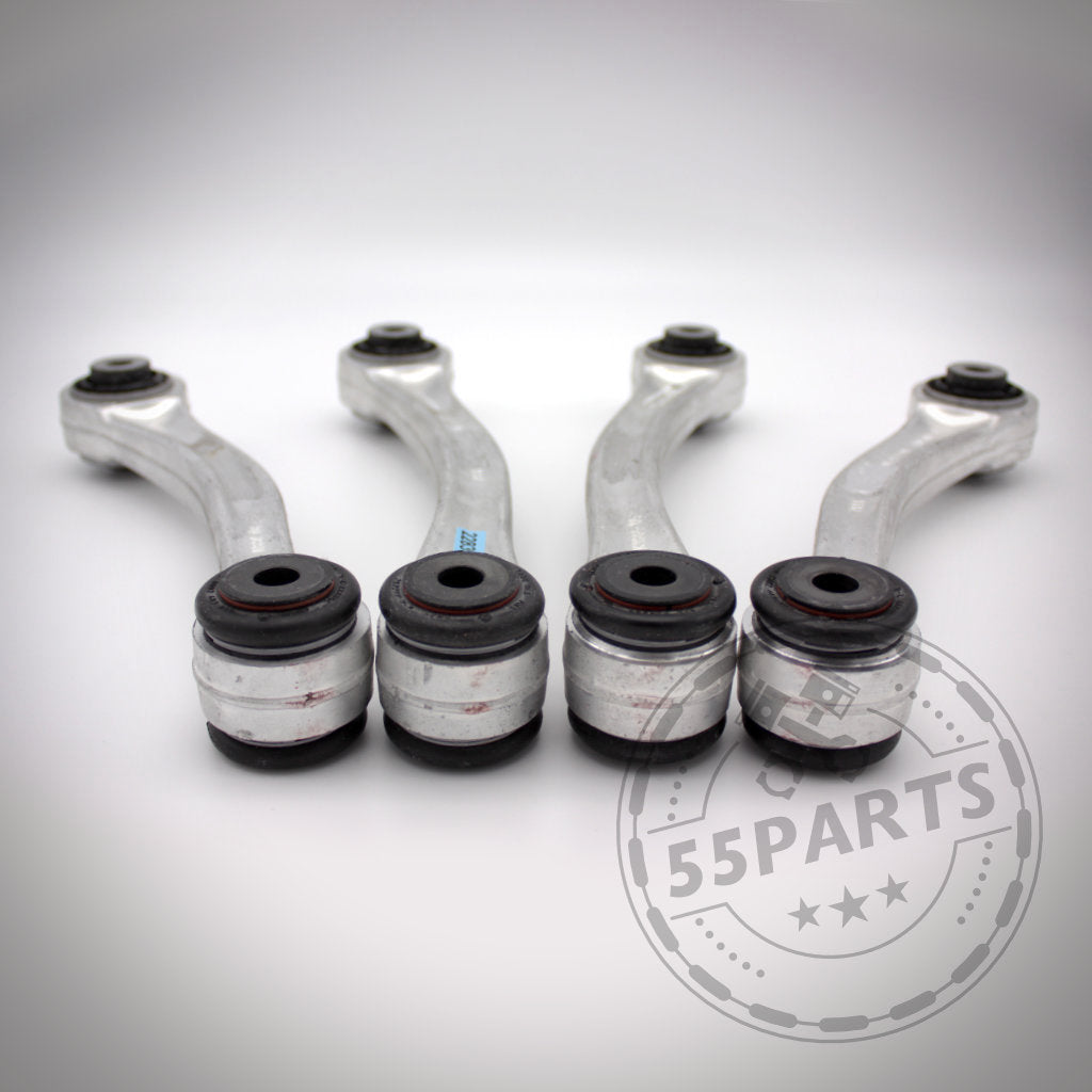 Vier M3 Fahrwerkskomponenten (mit NoFlex Bearings) sind in einer Reihe auf weißem Hintergrund angeordnet, ideal für BMW 1er E8x, 3er E9x Fahrwerk Upgrade oder Modifikationen.