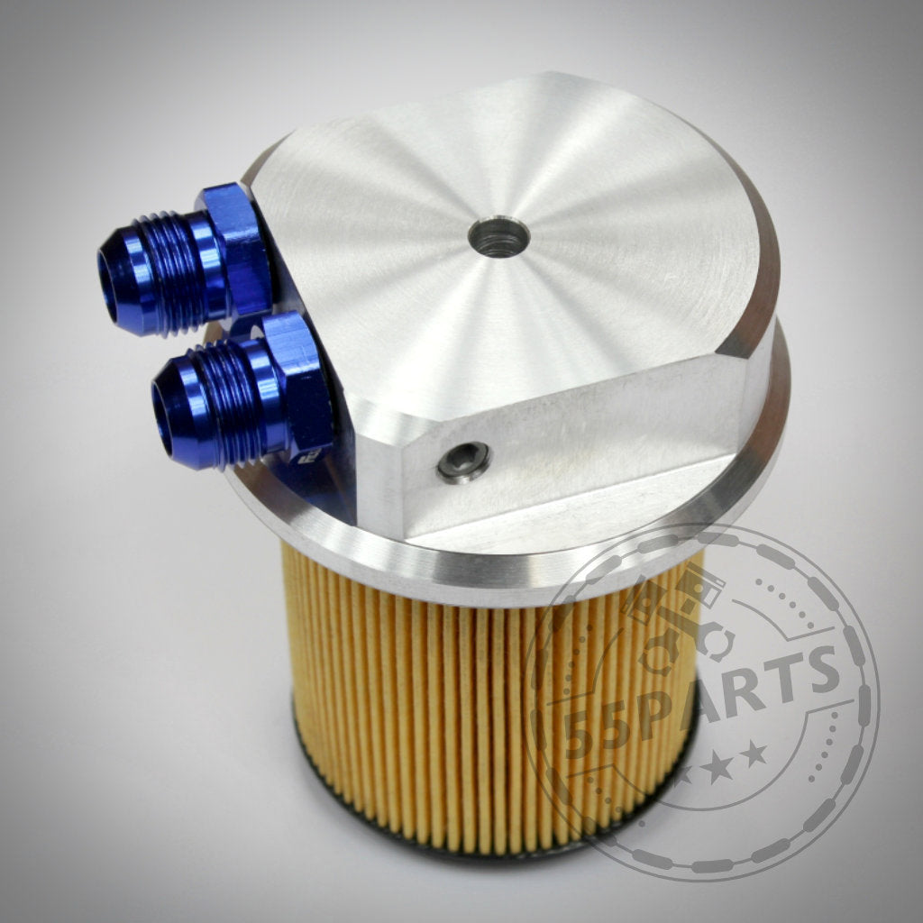 Adapterkappe externer Ölkühler- AN10 + 1,8" NPT, passend für BMW M50/M52, CNC-gefräst mit blauen Anschlüssen auf weißem Hintergrund – geeignet für externe Ölkühleranwendungen.