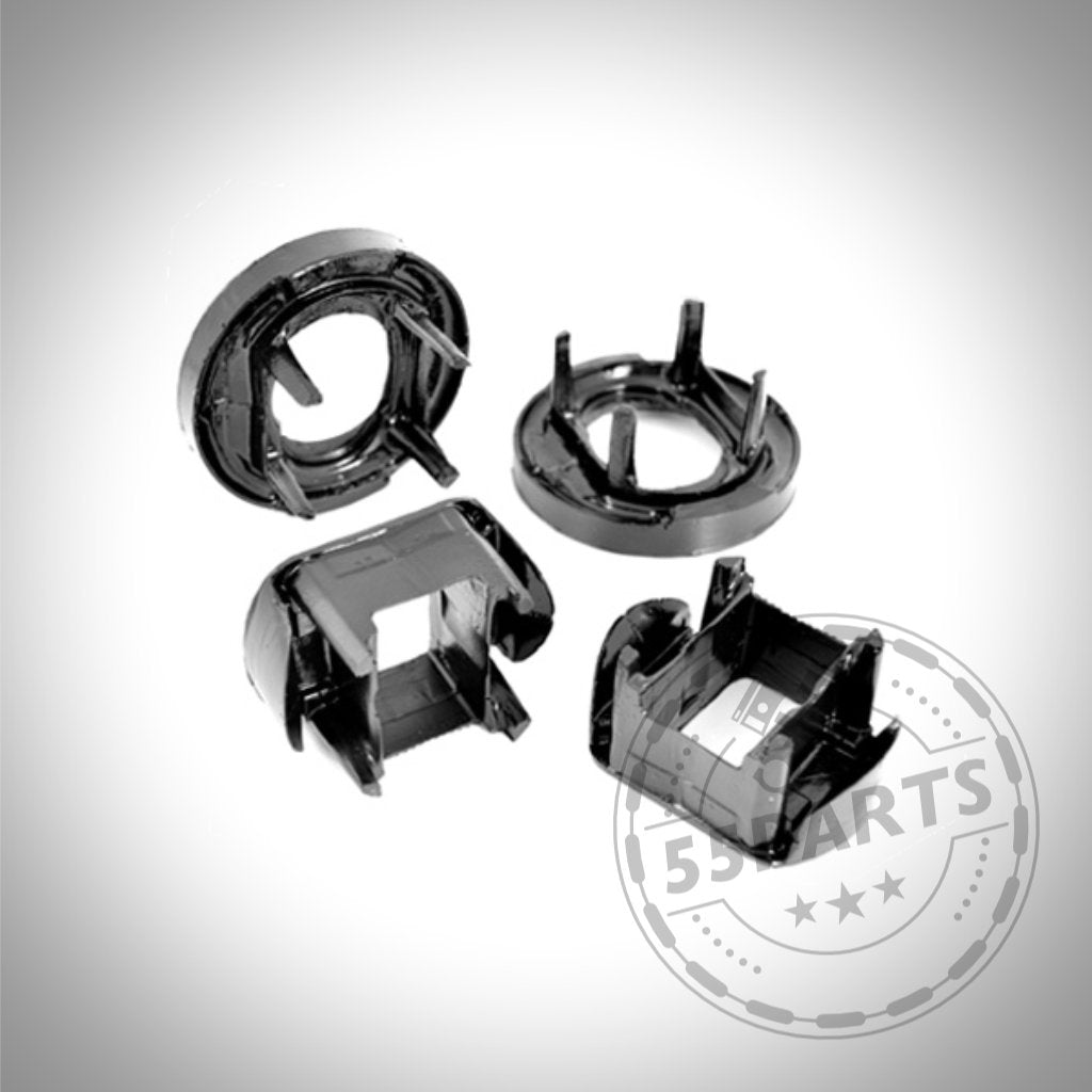 Vier schwarze PU Polyurethan Tonnenlager Einsätze, passend für BMW 1er (E8x, F2x), 2er (F2x), 3er (E9x, F3x) und 4er (F3x), sind auf weißem Hintergrund mit dezentem Wasserzeichen abgebildet.