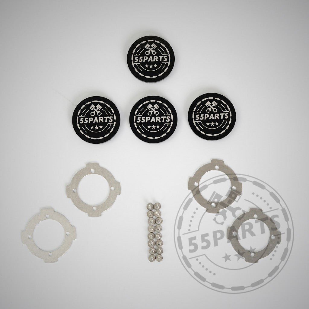 Vier 55Parts Special CNC-gefräste verschraubte Radnabendeckel für ProTrack One Räder, silberne Aluminiumhalterungen und Kugellager sind ordentlich auf einem weißen Hintergrund angeordnet.