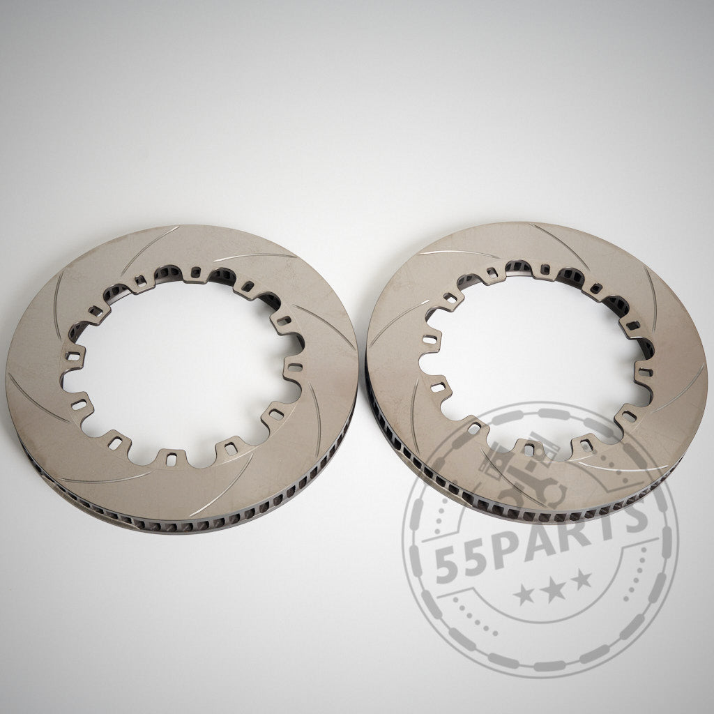 Zwei AP Racing 378x36mm CP5772-2068/69 Reibringe mit Schlitzrillen, nebeneinander auf hellem Hintergrund – perfekt zum Aufrüsten Ihrer BMW Rennstreckenbremsen oder Serienbremsanlage zur Leistungssteigerung.
