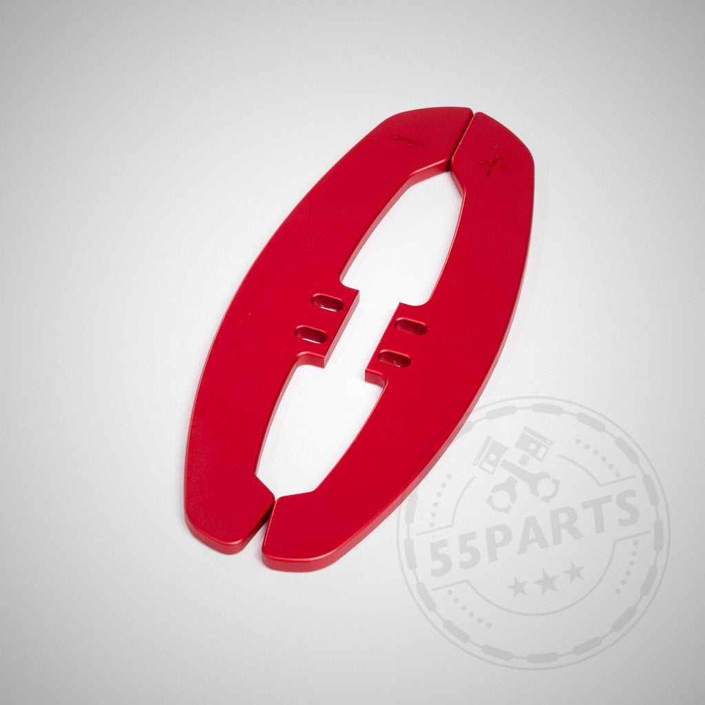 55Parts Spezielle CNC-gefräste Aluminium-Schaltwippen für magnetische Schaltwippen sind von oben auf einem hellgrauen Hintergrund abgebildet – rüsten Sie Ihren Antrieb mit hochwertigen magnetischen Schaltwippenerweiterungen auf.