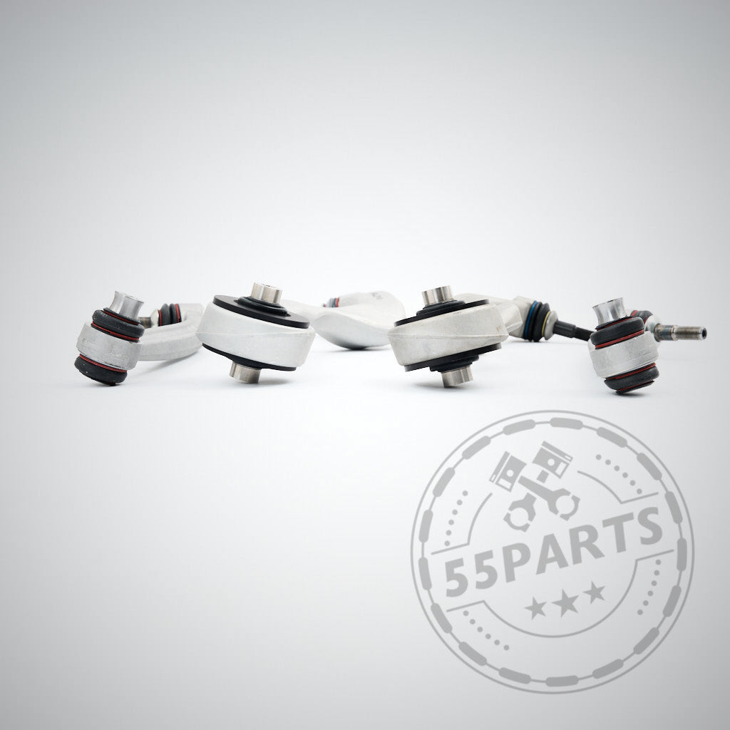 Sechs M3-Fahrwerkskomponenten (mit NoFlex-Lagern) werden auf einem weißen Hintergrund mit dem Wasserzeichen des Markenlogos angezeigt – ideal für Besitzer eines BMW 1er E8x oder 3er E9x, die ein komplettes Upgrade auf Uniball-Zugstrebenlager wünschen.