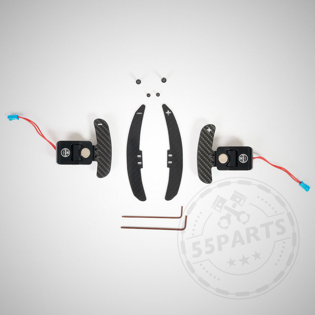 Das 55Parts Special V2 magnetische Schaltwippen-Kit enthält Kabel, Schrauben, Inbusschlüssel und Kohlefaser-Schaltwippen für fast alle BMW- und MINI-Modelle der F- und G-Serie. Plug & Play-Installation – aus dem Rennsport.