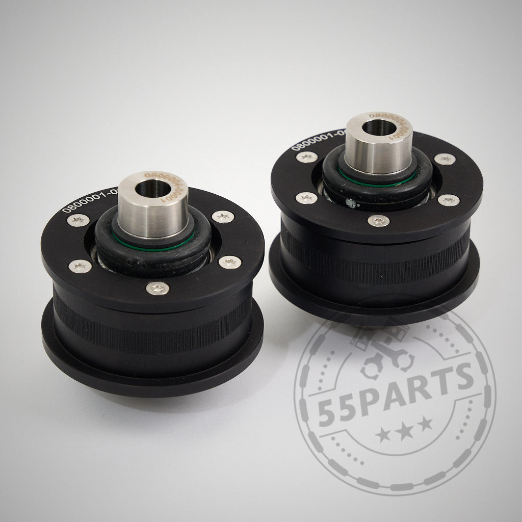 Zwei schwarze zylindrische NoFlex-Lager (Uniball-Lager) mit Metallkern, entwickelt für die BMW 1er, 2er, 3er und 4er F-Serie (F2x/F3x) einschließlich aller xDrive-Modelle – alle Motoren – auf einer hellen Oberfläche dargestellt.