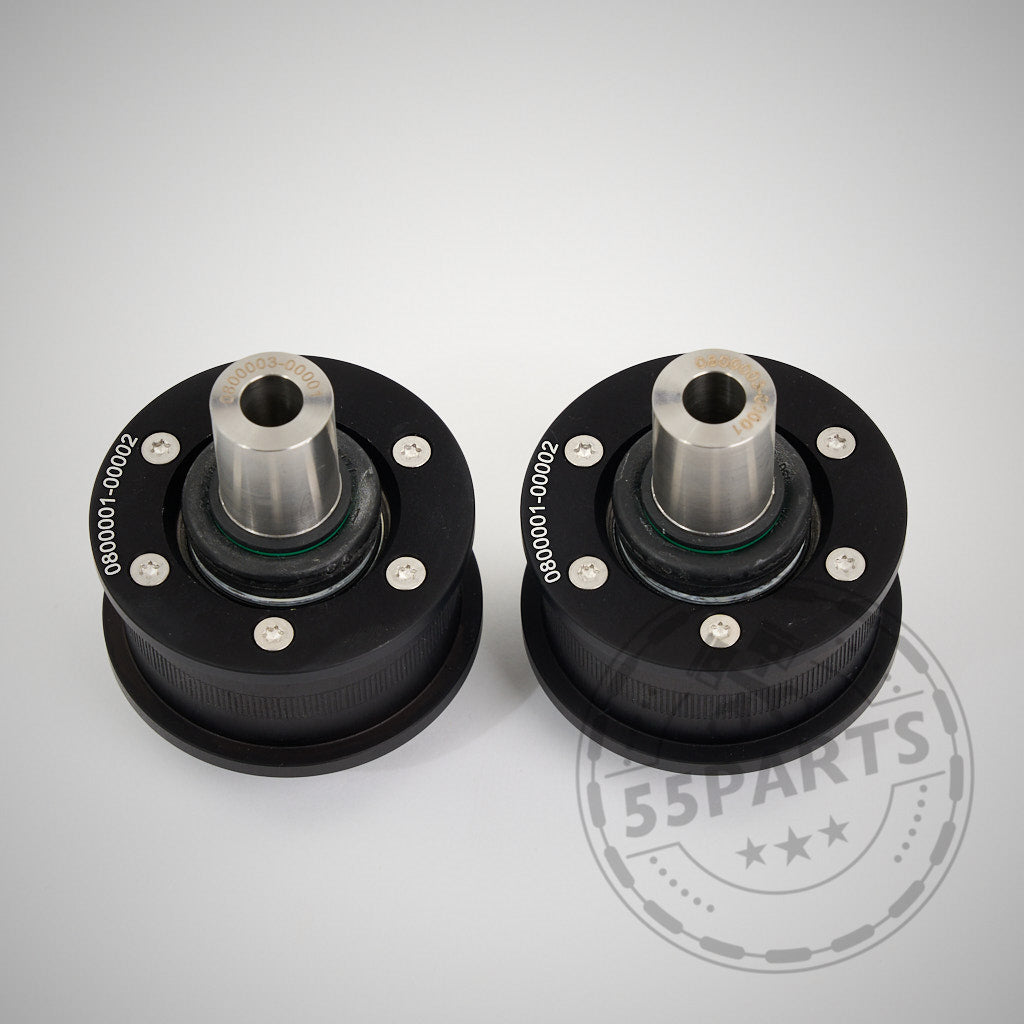 Zwei schwarze NoFlex-Lager (Uniball Lager vordere Zugstrebe) passend für BMW 1er–4er F-Serie (F2x, F3x) inkl. xDrive, alle Motorisierungen, auf hellem Hintergrund abgebildet. 55Parts-Wasserzeichen sichtbar.