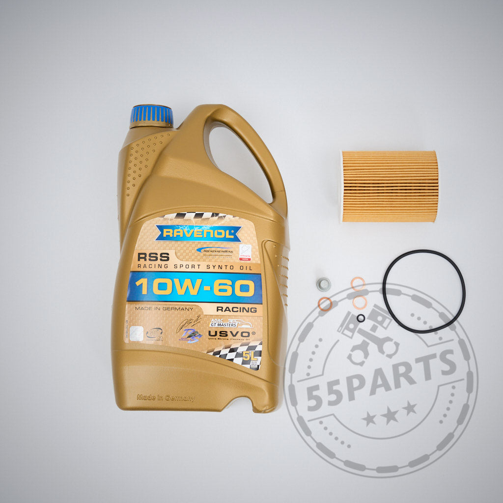 Das Ölwechselset passend für BMW E9x M3 mit dem S65-Motor umfasst einen goldenen Motul-Motorölbehälter, einen Papierölfilter, zwei Gummi-O-Ringe und eine kleine Metallscheibe, alles auf weißem Hintergrund abgebildet.