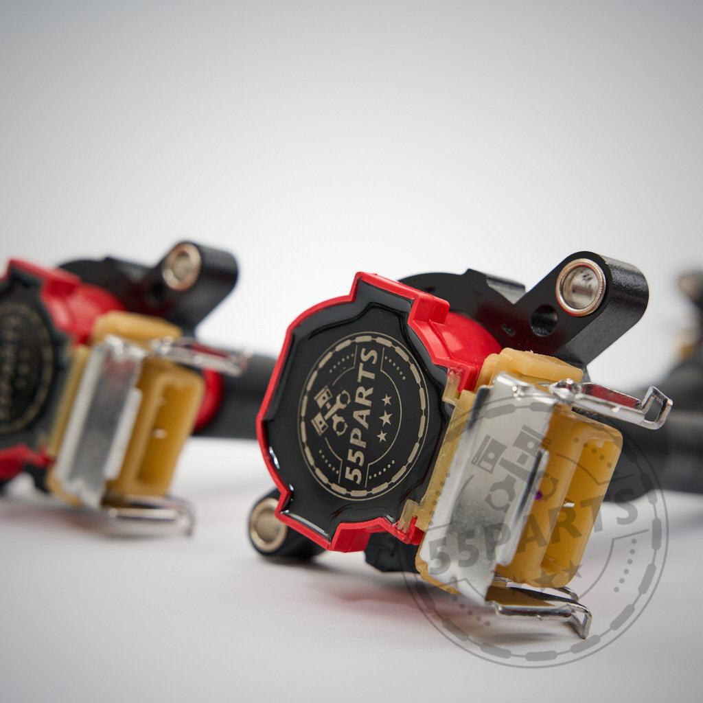 Nahaufnahme der Zündspulenbaugruppen Special, kompatibel mit den Motoren BMW M52, M54, M62, M73, S52 und S62, vor weißem Hintergrund.