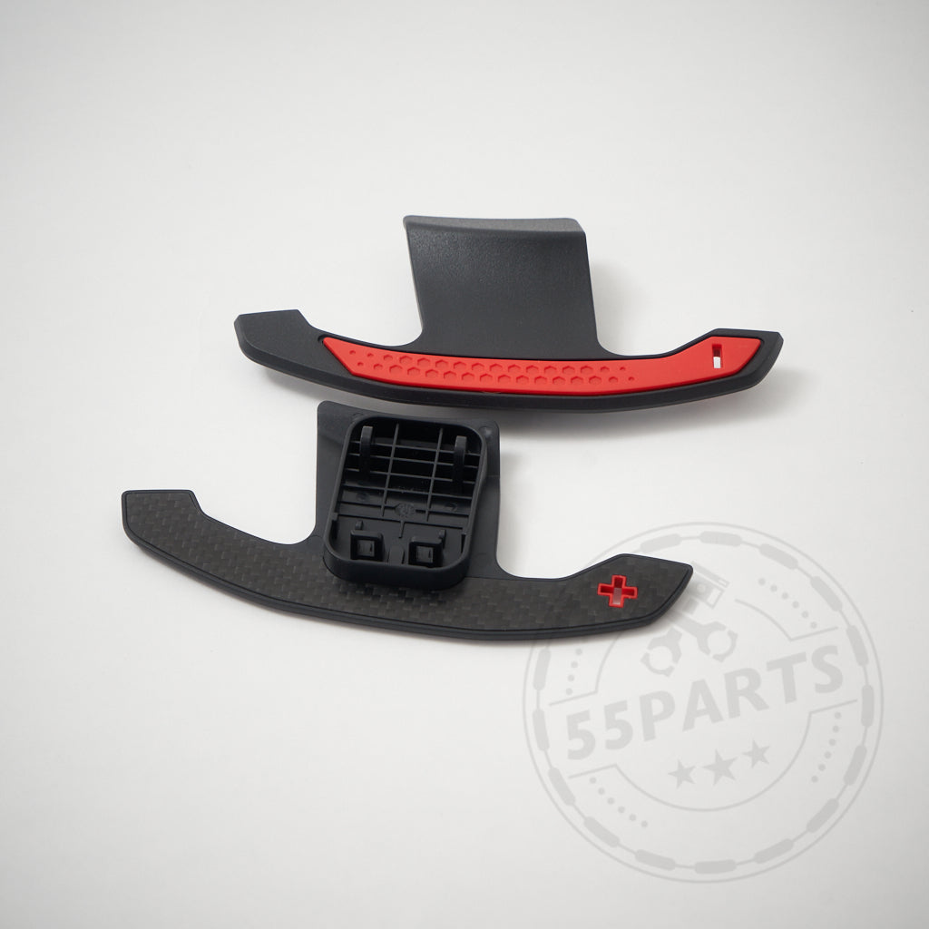 Auf weißem Hintergrund sind zwei Carbon-Schaltwippen abgebildet, kompatibel mit BMW 1/2/3/4 35 und 40i, M2, M3 und M4 F- und G-Serie.