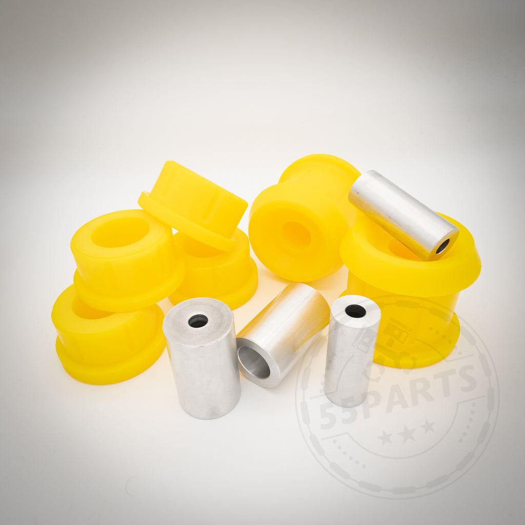 Gelbe PU Polyurethan Tonnenlager und silberne Metallhülsen passend für BMW 1er (E8x, F2x), 2er (F2x), 3er (E9x, F3x) und 4er (F3x) auf weißem Hintergrund – perfekt für Hinterachs-Upgrades.