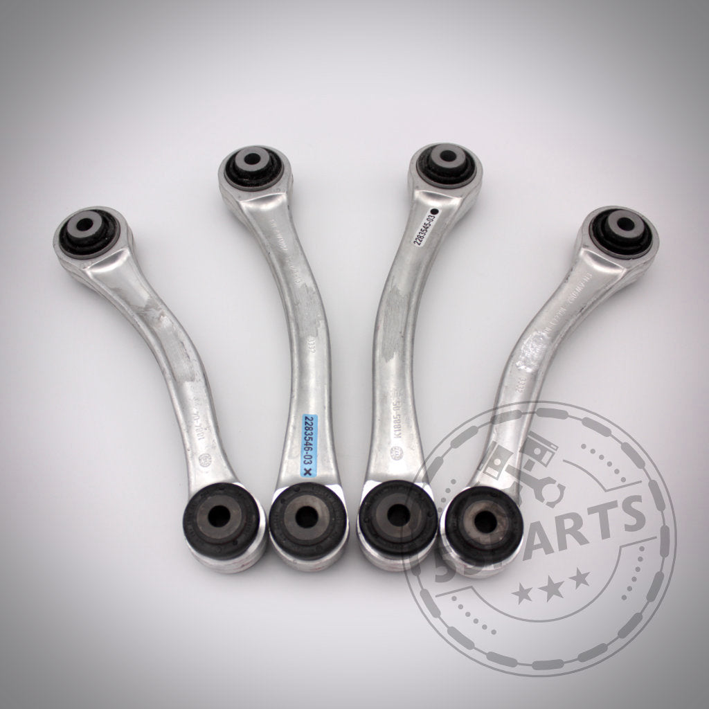 Vier silberne M3-Fahrwerkskomponenten (mit NoFlex-Lagern), nebeneinander angeordnet – Komplettset Uniball Zugstrebenlager passend für BMW 1er E8x, 3er E9x – perfekt für Fahrwerk-Upgrade oder Modifikationen.