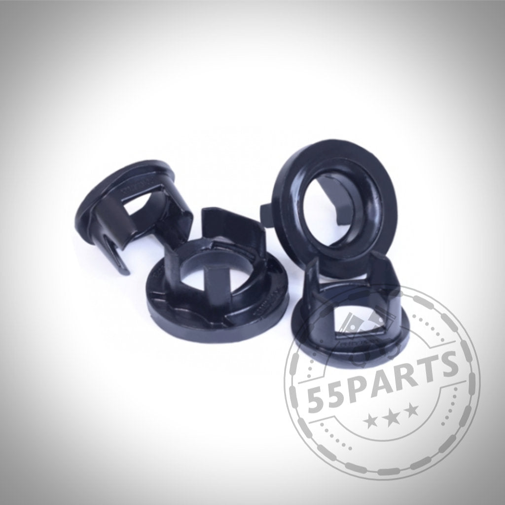 Vier schwarze PU-Polyurethan-Tonnenlagereinsätze, kompatibel mit BMW 1er (E8x, F2x), 2er (F2x), 3er (E9x, F3x) und 4er (F3x), dargestellt auf weißem Hintergrund mit einem „55Parts“-Wasserzeichen.