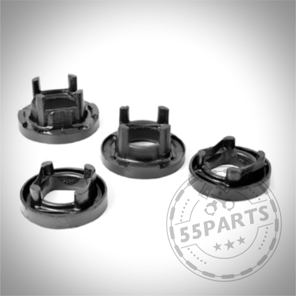 Vier schwarze PU Polyurethan Tonnenlager Einsätze, passend für BMW 1er (E8x, F2x), 2er (F2x), 3er (E9x, F3x) und 4er (F3x), abgebildet auf weißem Hintergrund mit Wasserzeichen.