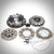 PTB Racing 55Parts Special Zweischeibenkupplung inkl. EMS passend für BMW E90/E92/E93 M3 S65: Kupplungsscheiben, Druckplatte und Bolzen auf weißem Hintergrund angeordnet.